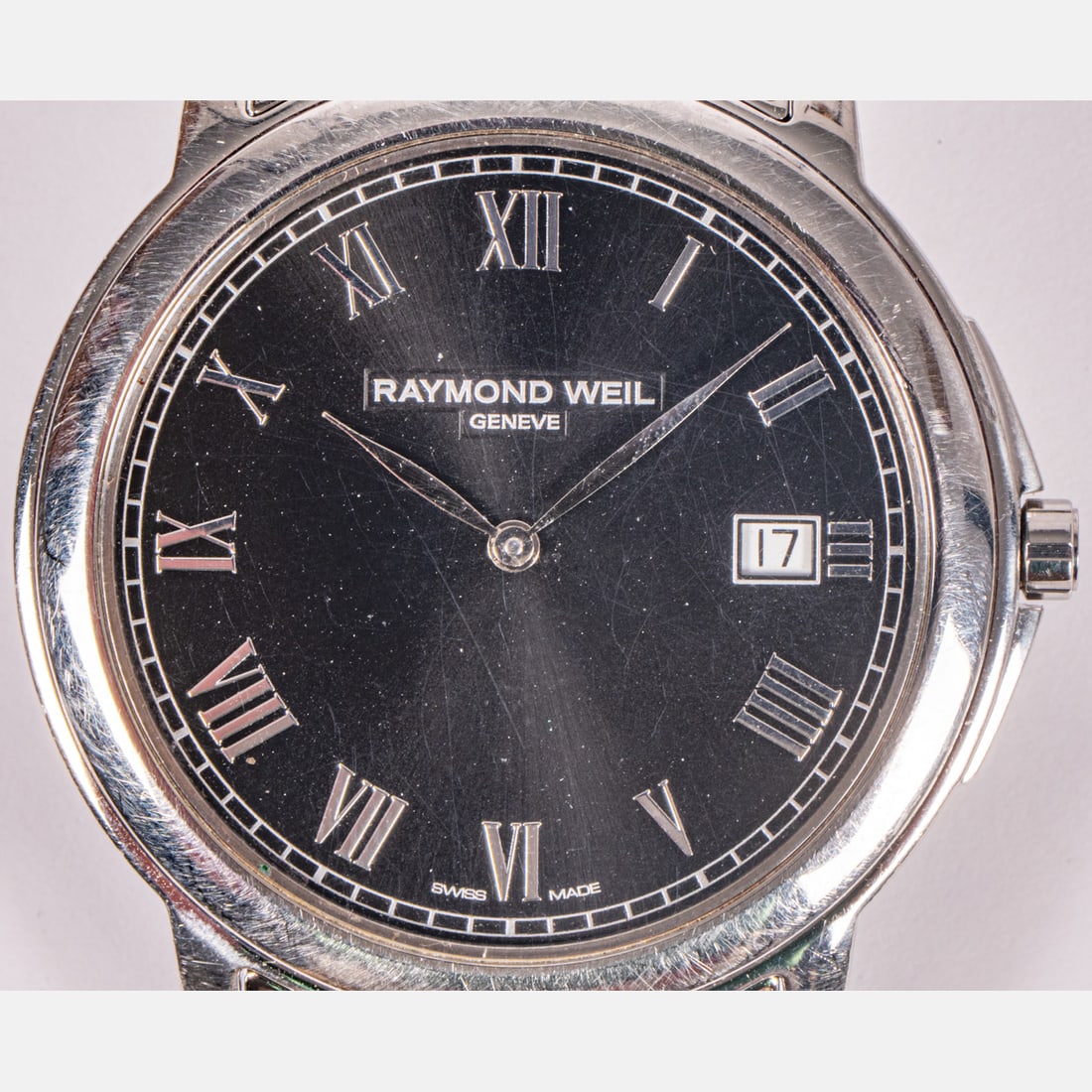 Raymond Weil Tradition Slim Men's Wristwatch: A Raymond Weil Tradition Slim Men's Wristwatch, Having stainless steel case and band. #5466-E311016. Width of case approx. 39mm.