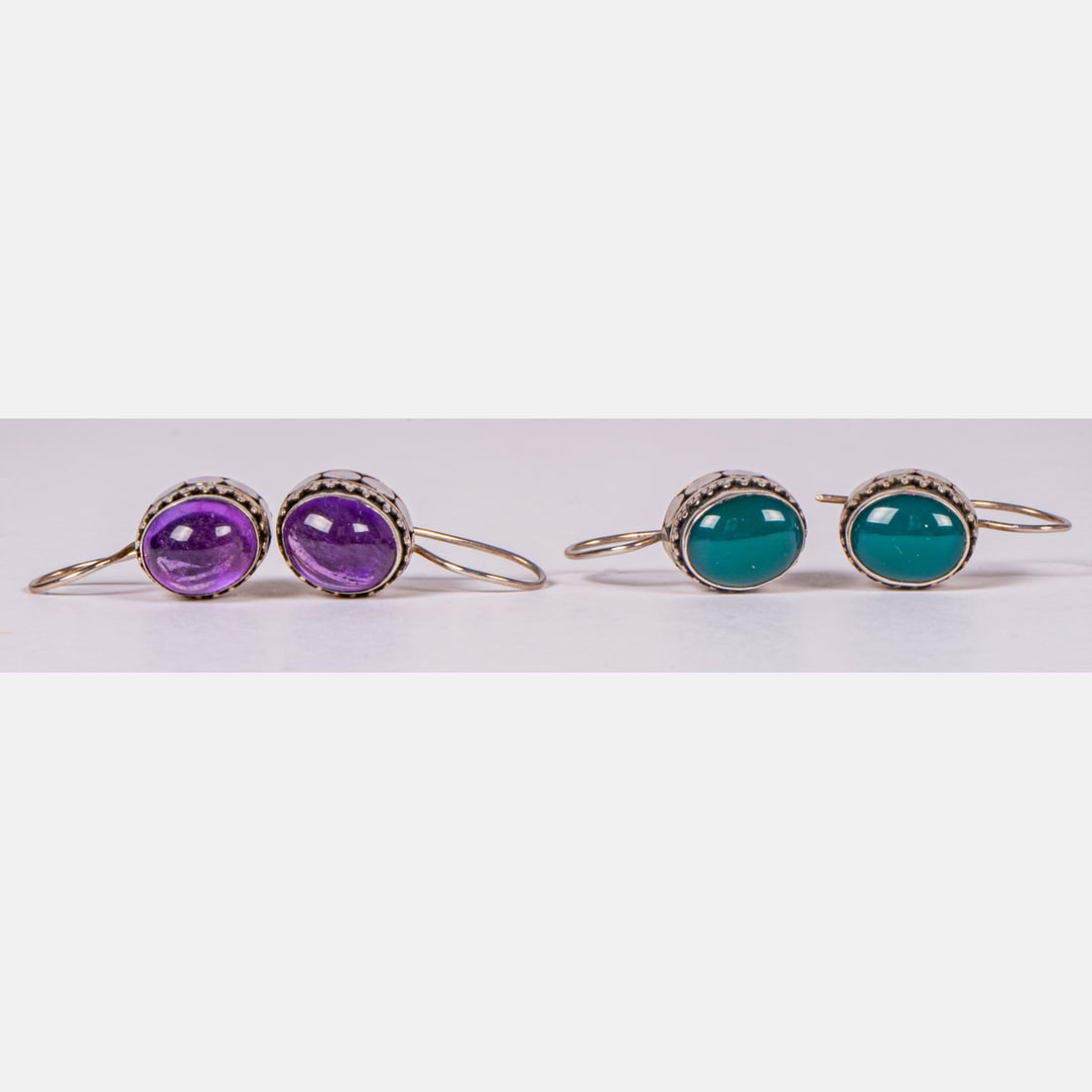 Two Pairs of Sterling Silver and Colored Glass Earrings: Two Pairs of Sterling Silver and Colored Glass Earrings, Each marked 925. Approx. weight: 0.26 troy oz. Please note no credit card payments for first time buyers and seven business day hold on all che