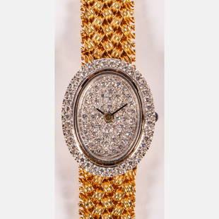 A Ladies Omega 14K Yellow Gold and Diamond Wristwatch,: A Ladies Omega 14K Yellow Gold and Diamond Wristwatch, With diamond melee, approx. 0.01-.02 pts. Band and case each marked 14K. Approx. weight: 21.4 dwt Dimensions: L: 6 x W: 1/2 in. Please note