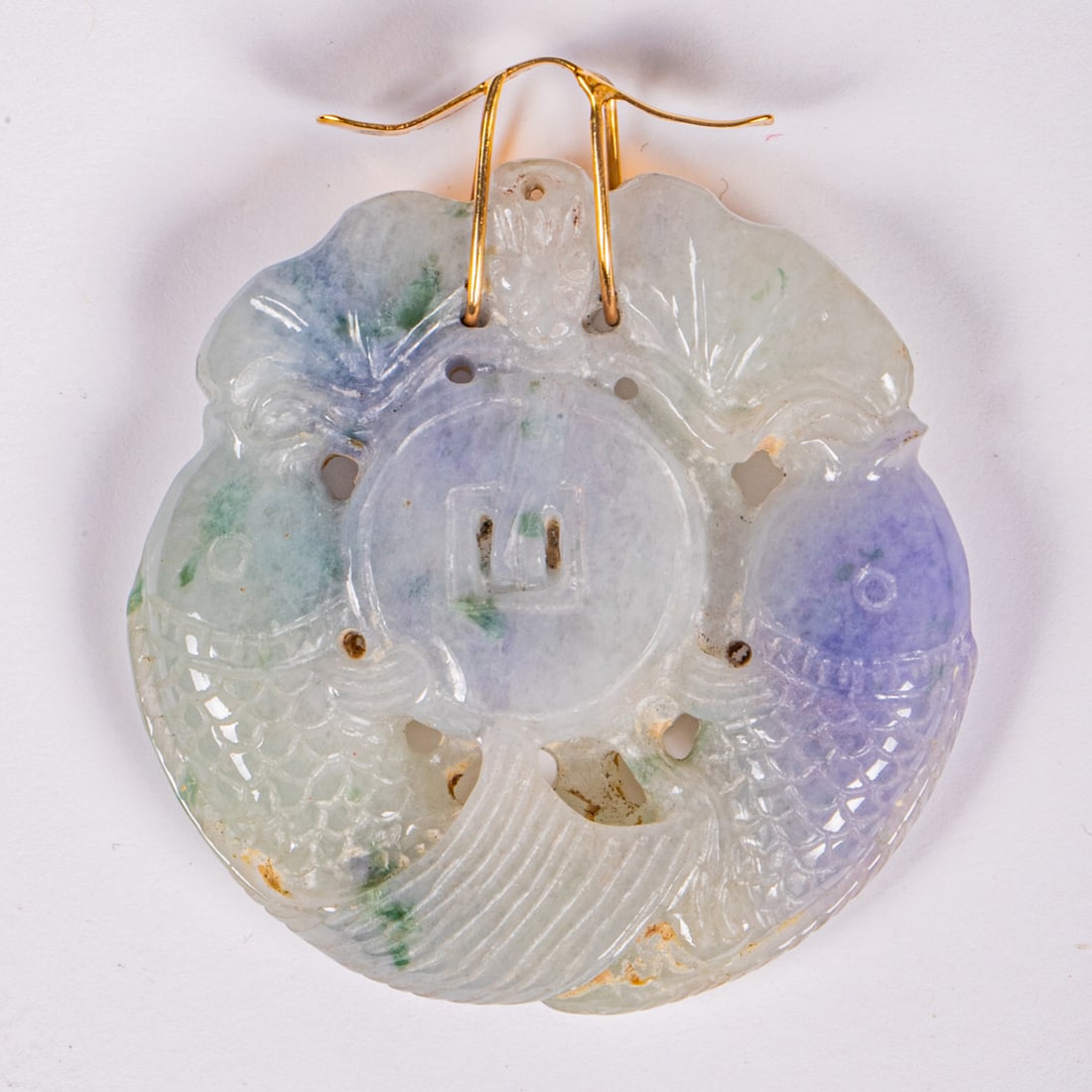 Chinese Lavender and Green Nephrite Carved Pendant: A Chinese Lavender and Green Nephrite Carved Pendant, With 14kt yellow gold mount. Approx. 8mm thick x 49mm diameter. Approx. weight: 24.1 dwt Please note no credit card payments for first time buyers