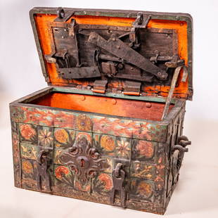 A Painted German Iron Strong Box/Armada Chest: A Painted German (poss. Nuremberg) Iron Strong Box/Armada Chest, 17th Century, Having strapwork hinged lid opening to an elaborate four lock functioning mechanism. With two large twisted iron handles