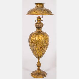 Moorish Style Pierced Brass Duplex Oil Floor Lamp: A Moorish Style Pierced Brass Duplex Oil Floor Lamp, 19th Century. H: 49 W: 18 1/2 D: 18 1/2 in. From the Estate of John A. Davidson, Jr. Proceeds to benefit the APL of Lorain County and the Dittrick