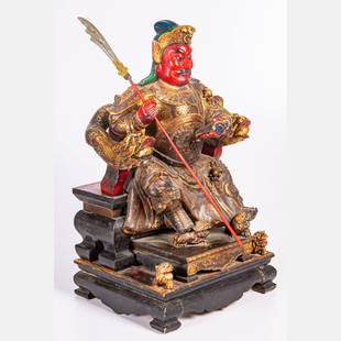 Asian Carved and Painted Wood Warrior: An Asian Carved and Polychrome Painted Wood Figure of a Warrior, 19th/20th Century. H: 26 3/4 W: 14 3/8 D: 12 3/8 in. From the Estate of John A. Davidson, Jr. Proceeds to benefit the APL of Lorain Cou