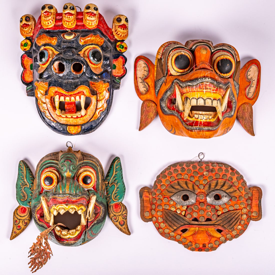 Four Indonesian Carved and Painted Masks (1 of 7)