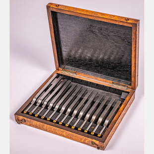 A Scientific Steel and Brass Tuning Fork Set: A Scientific Steel and Brass Tuning Fork Set, Early 20th Century, In a fitted oak box. H: 2 W: 10 1/8 D: 8 7/8 in. From the Estate of John A. Davidson, Jr. Proceeds to benefit the APL of Lorain County