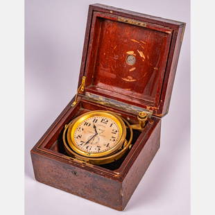 Longines Marine Chronometer with Gimbal: A Longines Marine Chronometer with Gimbal, 20th Century, In a fitted mahogany and brass box. No. 5117714. In working order. Box numbered 5117712. H: 4 W: 6 1/8 D: 6 1/8 in. From the Estate of John A.