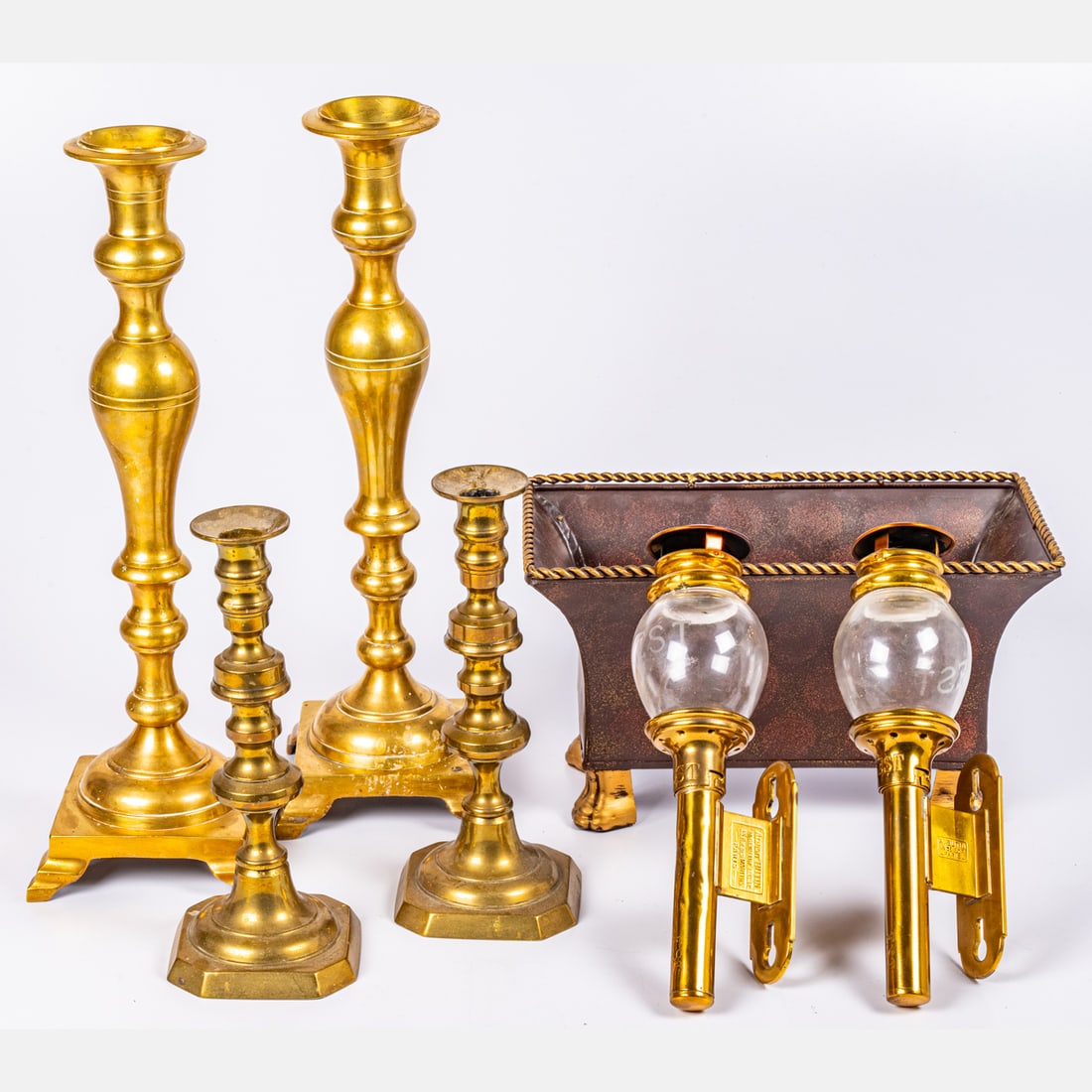 A Group of Brass Candlesticks (1 of 5)