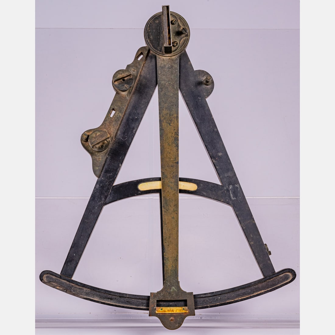 Ebonized Wood and Bronze Octant: An Ebonized Wood and Bronze Octant, 19th Century, Maker unknown. H: 2 3/4 W: 16 D: 12 1/2 in. From the Estate of John A. Davidson, Jr. Proceeds to benefit the APL of Lorain County and the Dittrick Mus