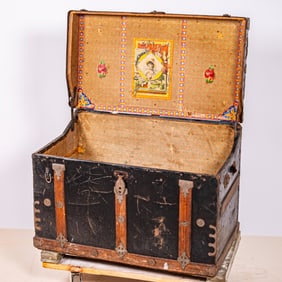 A Metal and Wood Bound Traveling Trunk
