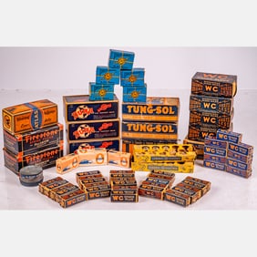 Collection Of Spark Plugs And Auto Lamp Bulbs