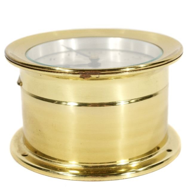 A Howard Miller Brass Ships Clock, 20th Century.: A Howard Miller Brass Ships Clock, 20th Century. Dimensions: h: 3 x w: 5 in.