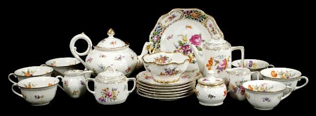 A Collection of German and Bavarian Porcelain Cups: A Collection of German and Bavarian Porcelain Cups, Saucers, Teapot, Creamers, and Lidded Sugars.