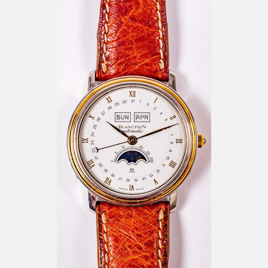 Blancpain Villeret 18kt Yellow Gold And Stainless Steel Watch: Blancpain Villeret 18kt Yellow Gold And Stainless Steel Watch 33 mm case. Triple calendar moonphase. Roman numeral hour markers. Arabic numeral dates with a third, crescent-tipped hand pointing to the