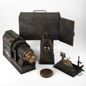 A Russian Painted Metal Magic Lantern with Case, with Dual Light Source, Electric and Lime Light