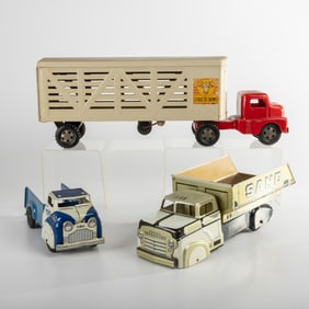 Three Pressed Metal Delivery Toy Trucks
