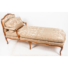 A French Provincial Carved Walnut Chaise Longue