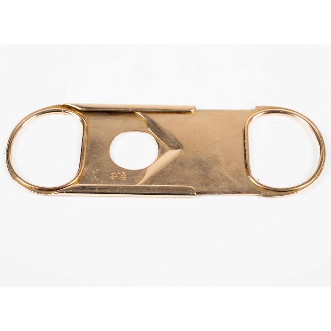 A 10 Karat Yellow Gold Slide out Cigar Cutter: A 10 Karat Yellow Gold Slide out Cigar Cutter. Marked 10K L: 2 W: 1 in. From a Northeast Ohio Collector.
