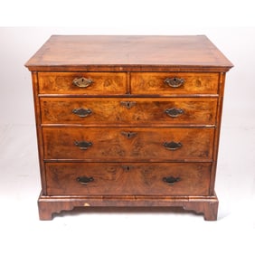 A George I Walnut Chest Of Drawers