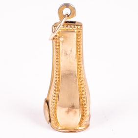 A 14 Kt. Yellow Gold and Metal Cigar Cutter Fob