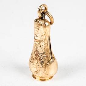 A 14 Kt. Yellow Gold and Metal Cigar Cutter Fob
