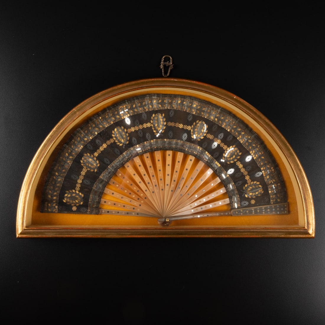 Antique French Fan in Shadowbox Display Frame: An Antique French Fan in Shadowbox Display Frame Inlaid bone, black lace decorated with metal floriform and leaf shapes. L: 15 7/8 x D: 9 7/8 x H: 2 in. From the estate of an Ohio collector.