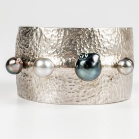 A Hammered Sterling Silver and Tahitian Pear Cuff Bracelet.