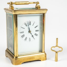 A French Gilt Brass Carriage Clock
