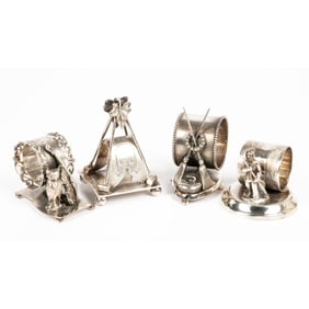Four Victorian Silver Plated Figural Napkin Rings