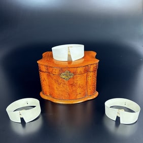 Thirteen Antique Detachable Paper Collars Housed in a Fitted Shaped Box,