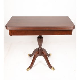 An English Regency Style Mahogany Flip-Top Game Table