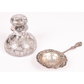A Sterling Silver Tea Strainer by Manchester Silver Company together with a Silver overlay Clear