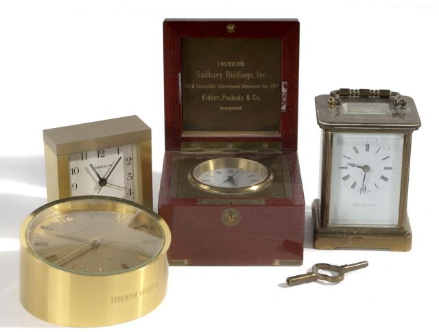 A Group of Four Tiffany & Co. Brass Clocks,: A Group of Four Tiffany & Co. Brass Clocks, 20th Century, Two inscribed.