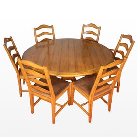 A Rustic Maple Circular Pedestal Table and Six Chairs