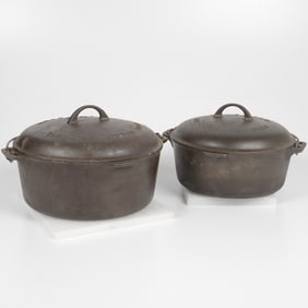 Two Griswold Tight Top Dutch Ovens
