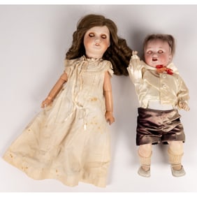 Two Bisque Porcelain Dolls