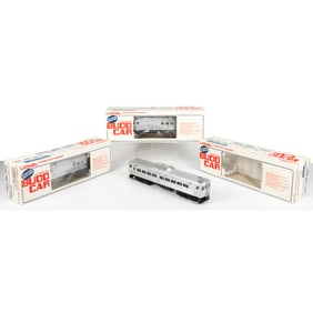 Three Lionel Train Budd Cars