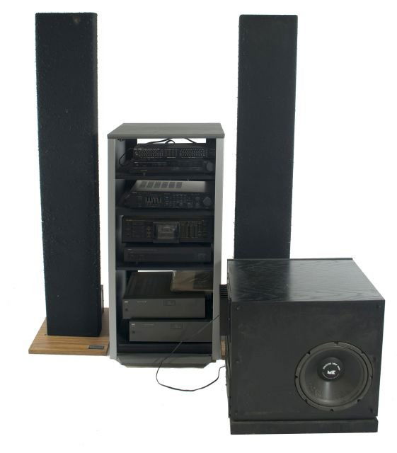 A Vintage Sound System, 20th Century.: A Vintage Sound System, 20th Century. Including pieces by makers NAD, Denon, Acoustat, Yamaha and Nakamichi. *** Please inquire for shipping estimate prior to bidding. Shipping costs may exceed item v