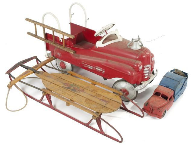 A Collection of Vintage Toys, 20th Century,: A Collection of Vintage Toys, 20th Century, Including a fire truck pedal wagon, a Flexible Flyer sled, and a Structo garbage truck. *** Please inquire for shipping estimate prior to bidding. Shipping
