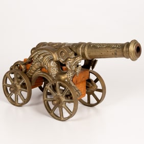 A Brass Ornamental Dragon Form Cannon.