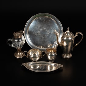 A Gorham Sterling Silver Four Piece Coffee Set in the Puritan Pattern