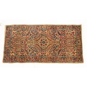 A Kerman Wool Rug