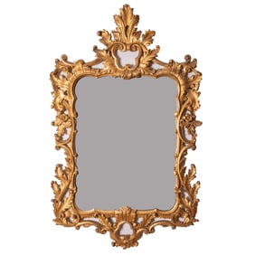 A Rococo Style Gilt Carved Wood Mirror