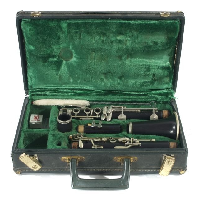 An M. Masson Clarinet and Case, 20th Century.: An M. Masson Clarinet and Case, 20th Century. Provenance: From the estate of James Lawrence, Akron, Ohio.