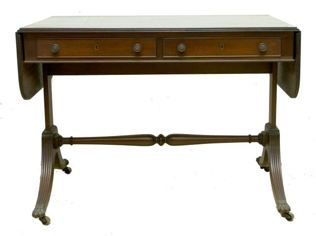 A Regency Style Mahogany Sofa Table, Early 20th Century: A Regency Style Mahogany Sofa Table, Early 20th Century. Dimensions: h: 28 x w: 38 x d: 34 in.