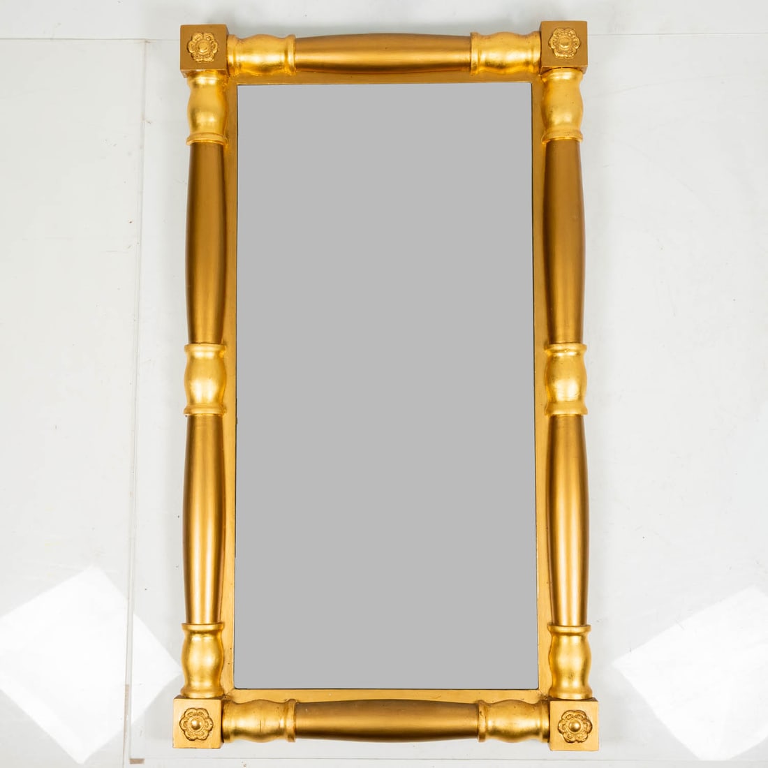 American Sheraton Giltwood Pier Mirror: American Sheraton Giltwood Pier Mirror, 19th Century, Columns on all sides ending at square corner blocks with carved rosettes in relief. H: 46 7/8 W: 26 5/8 D: 2 1/4 in.