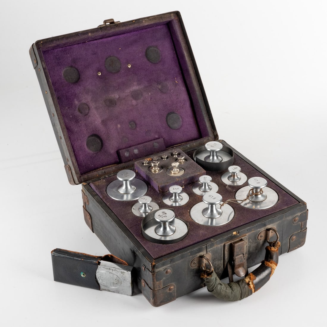 Hobart of Dayton Steel Calibration Weights: Hobart of Dayton Steel Calibration Weights, 20th Century, Scientific weights ranging in weight from 1/4 oz to 5 lbs with a steel weight bar. In a fitted wooden case. H: 5 1/4 W: 11 3/8 D: 10 