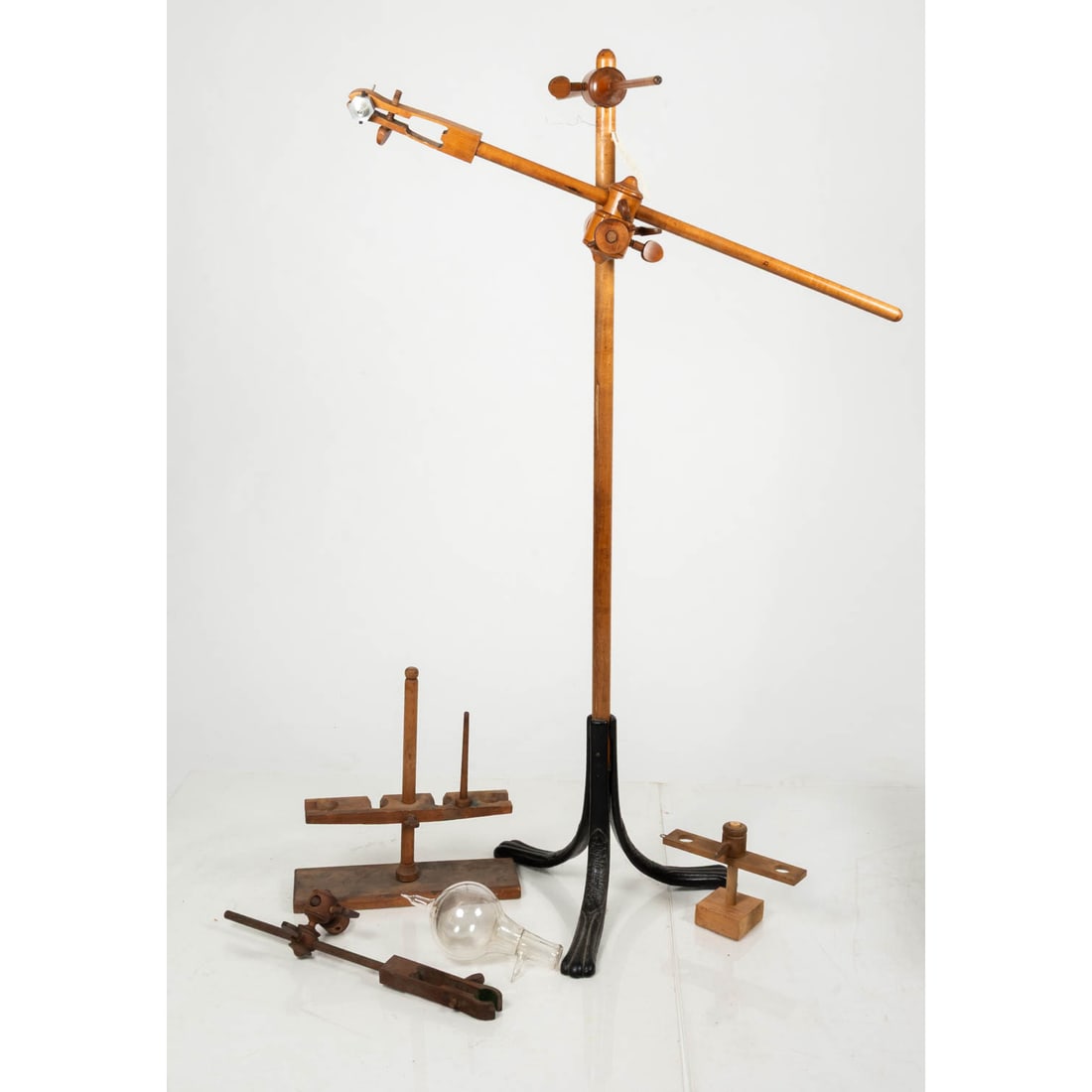 Campbell Bros Cathode X-Ray Tripod & Stands: Campbell Bros Cathode X-Ray Tripod & Stands, early 20th Century, Cast-iron base made in Lynn, MA, holds a 50 inch wooden pole from which various arms would be clamped to hold a cathode ray tube used