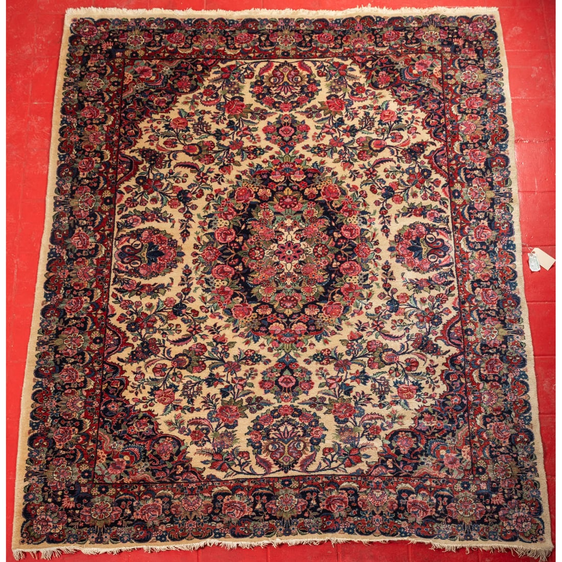 A Kerman Wool Rug, (1 of 4)