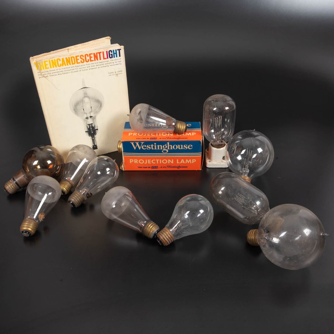 Various Antique Incandescent Light Bulbs: Various Antique Incandescent Light Bulbs, 20th Century, Comprising bulbs of various sizes and wattages: Westinghouse Projection Lamp 500W in box Westinghouse 50W (5) Square Deal 60 W Mazda 500W Mazda