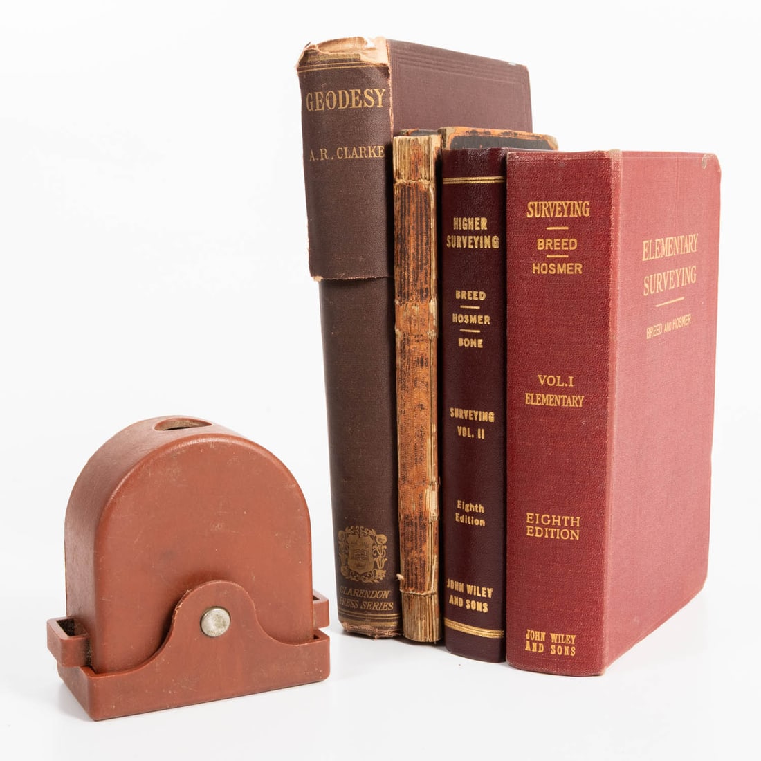 Brunton Pocket Transit and Surveying Books.: Brunton Pocket Transit, 20th Century. Set of 4 books on surveying. In a case, marked "D. W. Brunton's Pocket Transit Trade Mark Reg. US Pat Off." and Wm. Ainsworth & Sons, Denver, CO. and No. 82034. 